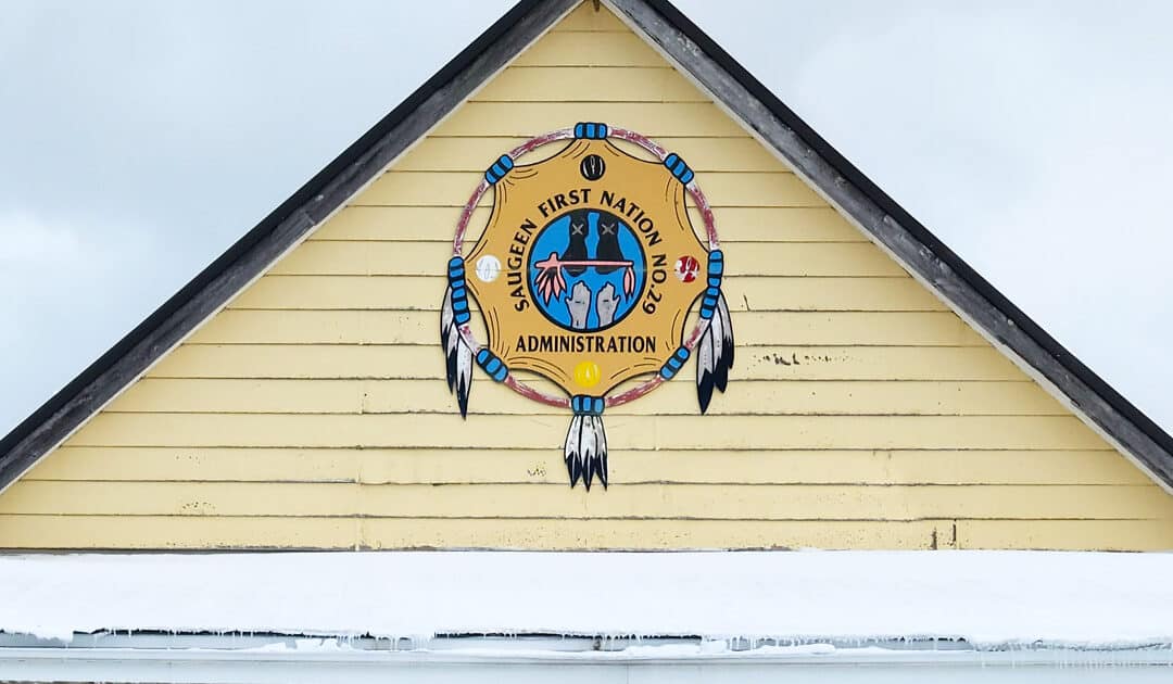 An image of the Saugeen First Nation's Administration Center featuring its logo.